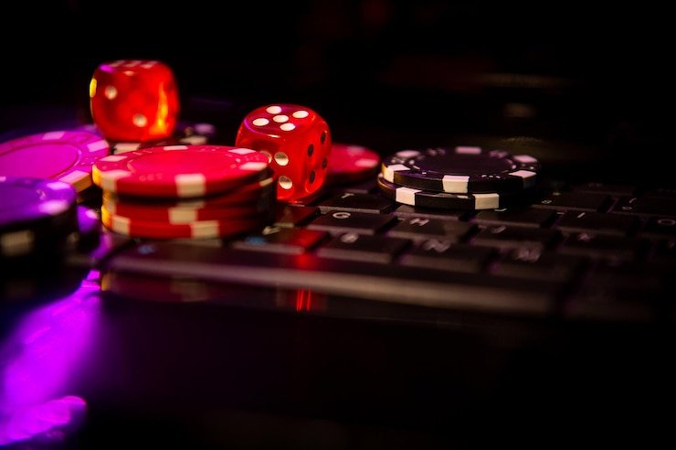 Playtech multi-camera studio setup showing dealer, cards, and live chat interface